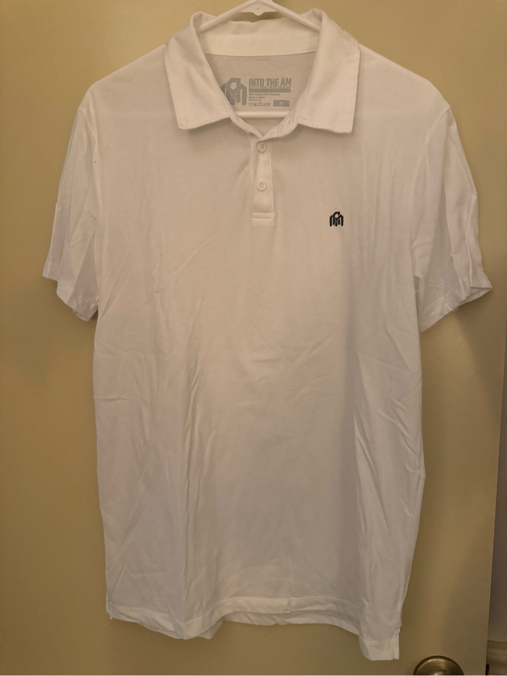 Into The AM Men's White Polo with Subtle Logo